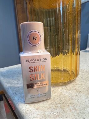 Revolution Skin Silk Luminous Serum Foundation - Light Pink & Rose Gold Accents